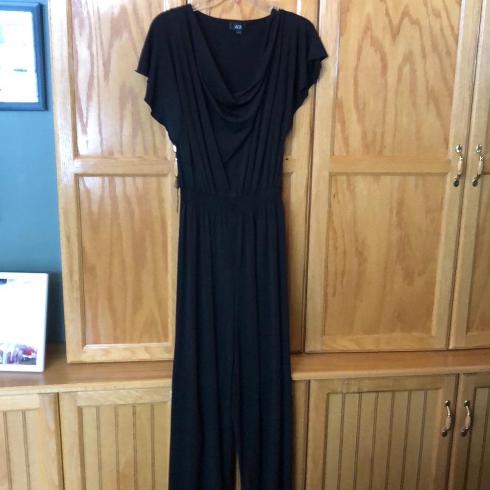 Black romper pant suit.